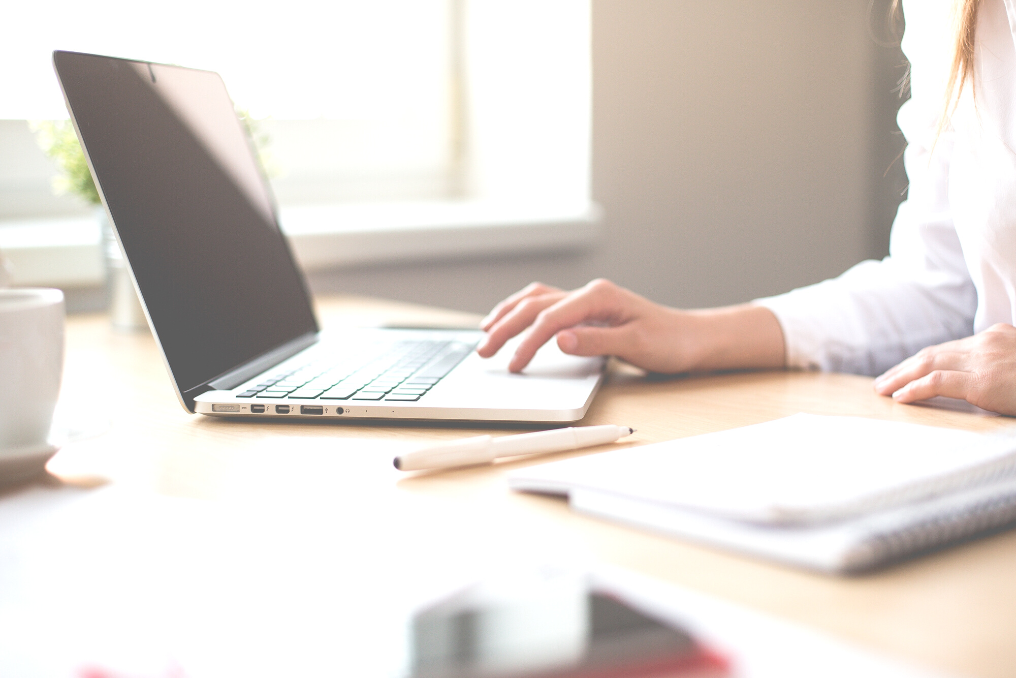 Woman Working on a Laptop